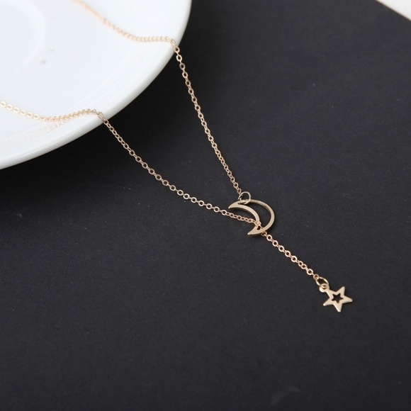 Jewelry - Gold Tone Moon and Star Y Celebrity Drop Necklace